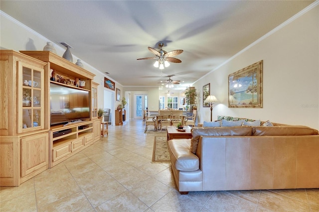 tiled living room with crown molding and ceiling fan