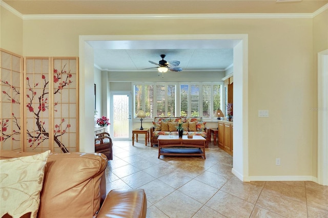 living room featuring crown molding, ceiling fan, and light tile patterned floors