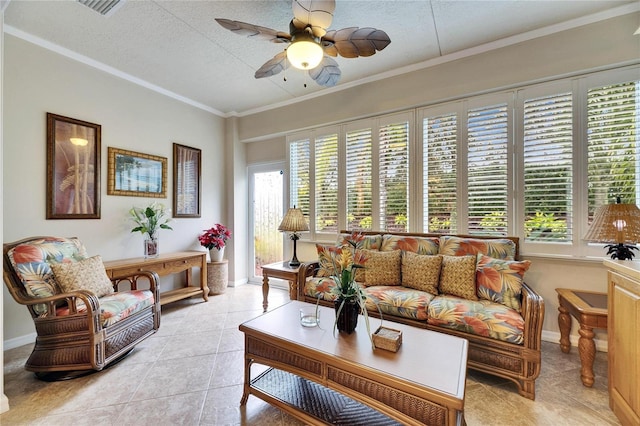 living room featuring light tile patterned flooring, ornamental molding, a wealth of natural light, and a textured ceiling