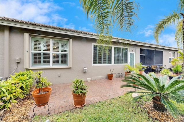 back of house with a patio area