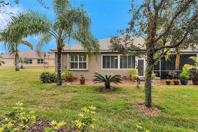 exterior space with a yard and a patio