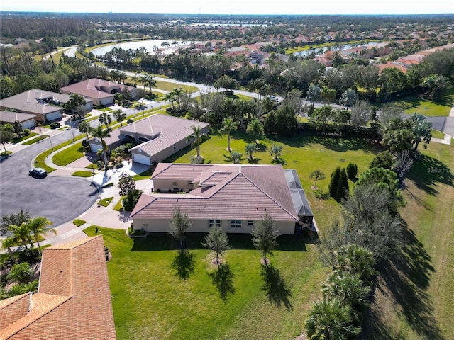 drone / aerial view featuring a water view