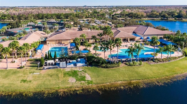 birds eye view of property featuring a water view