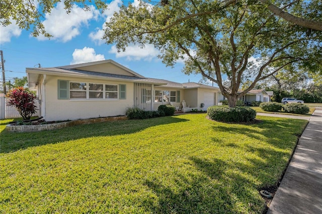 ranch-style house with a front lawn