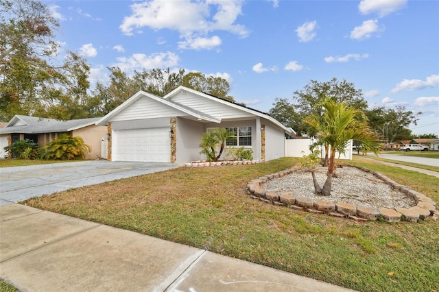 ranch-style home with a garage and a front lawn