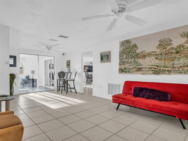 interior space featuring ceiling fan