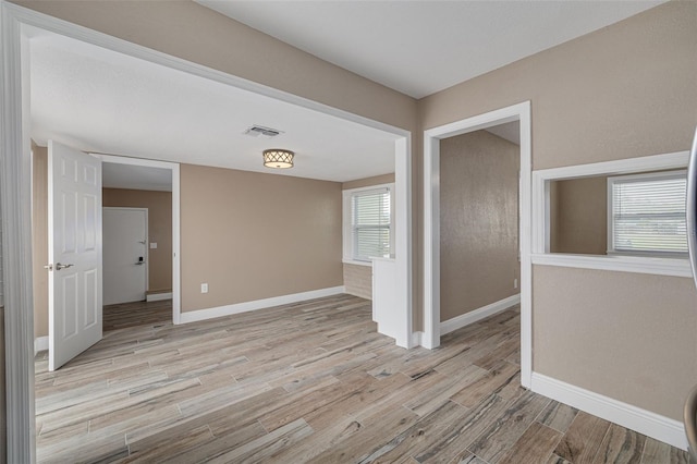 empty room featuring light hardwood / wood-style flooring