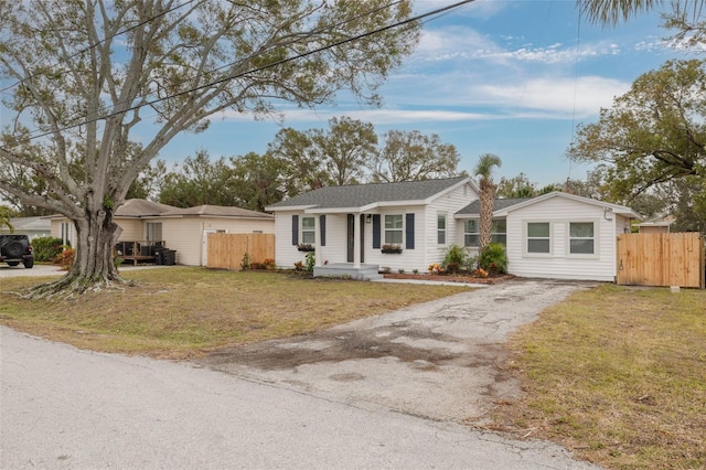 ranch-style house with a front yard