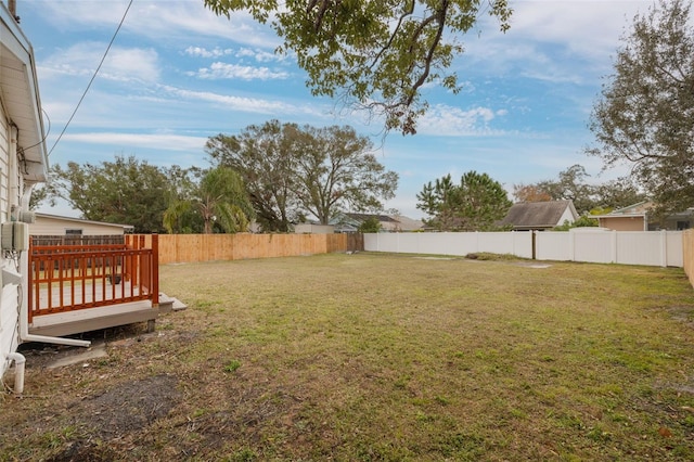 view of yard featuring a deck