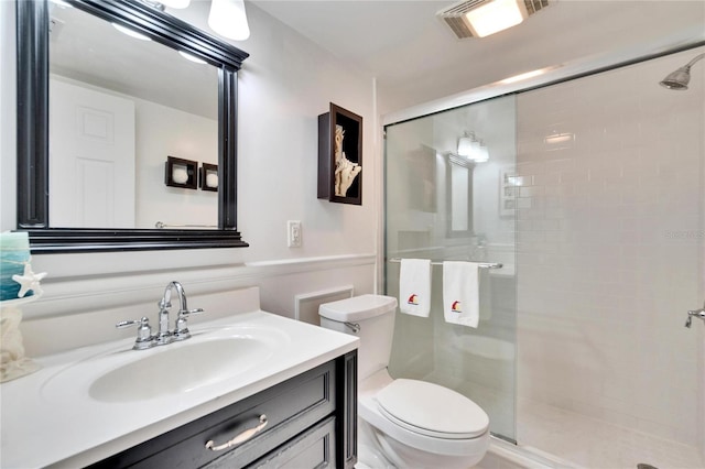 2589 Redwood Cir, Clearwater, FL 33763 - bathroom with toilet, a stall shower, and vanity
