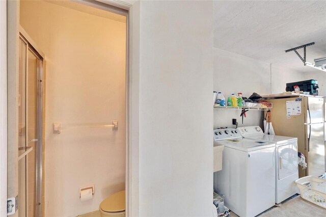 2589 Redwood Cir, Clearwater, FL 33763 - washroom with washing machine and dryer