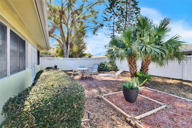 2589 Redwood Cir, Clearwater, FL 33763 - fenced backyard with a patio