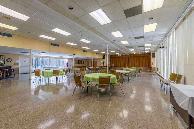 2589 Redwood Cir, Clearwater, FL 33763 - dining room with a paneled ceiling and speckled floor