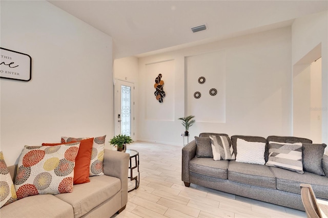 living room with light hardwood / wood-style flooring