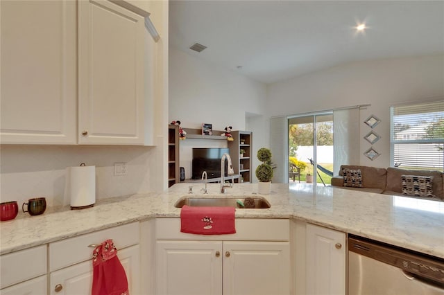 kitchen featuring white cabinetry, dishwasher, and sink