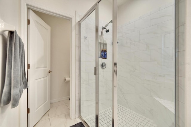 bathroom featuring an enclosed shower