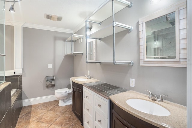 bathroom with ornamental molding, toilet, and vanity