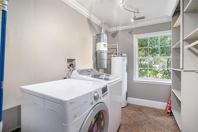 laundry area featuring independent washer and dryer, crown molding, water heater, and light tile patterned floors