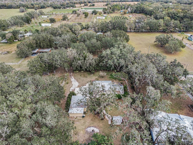 birds eye view of property with a rural view