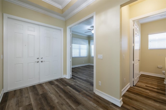 hall with crown molding and dark wood-type flooring