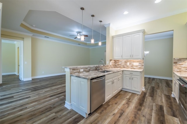 kitchen with white cabinetry, sink, kitchen peninsula, and dishwasher