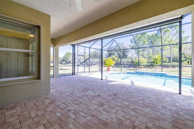 view of pool with ceiling fan