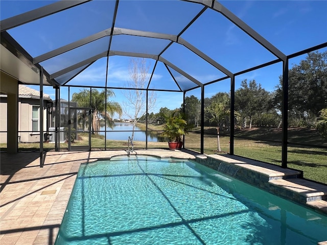 view of swimming pool featuring a water view, a patio area, and a lanai