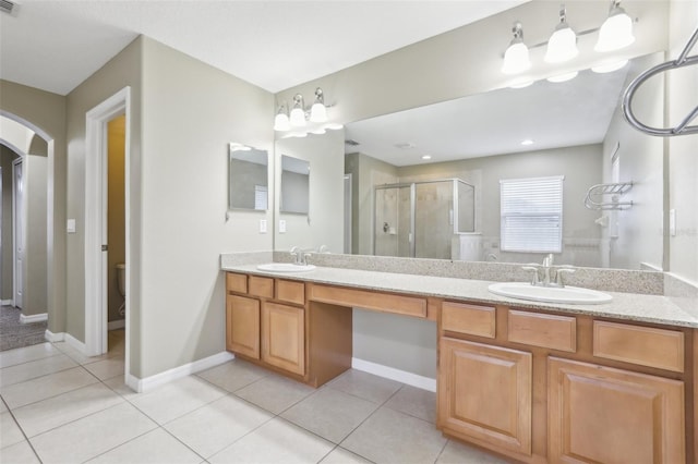 bathroom with vanity, an enclosed shower, tile patterned floors, and toilet