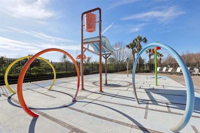 view of sport court featuring a playground