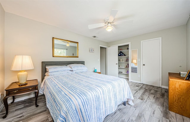 bedroom featuring hardwood / wood-style floors and ceiling fan