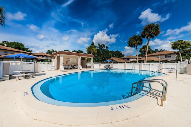 view of pool featuring a patio area