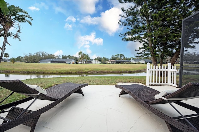 view of patio / terrace with a water view