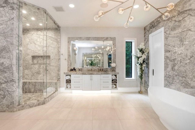 bathroom featuring vanity, tile patterned floors, and independent shower and bath