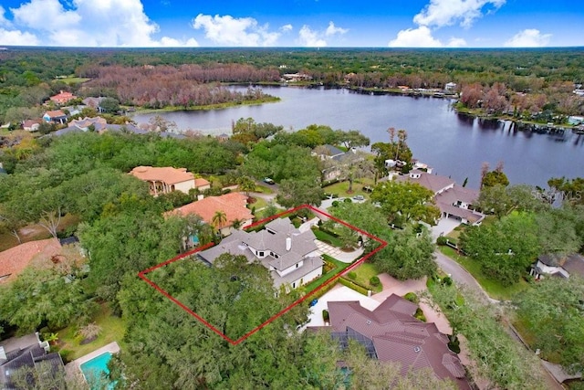 birds eye view of property with a water view