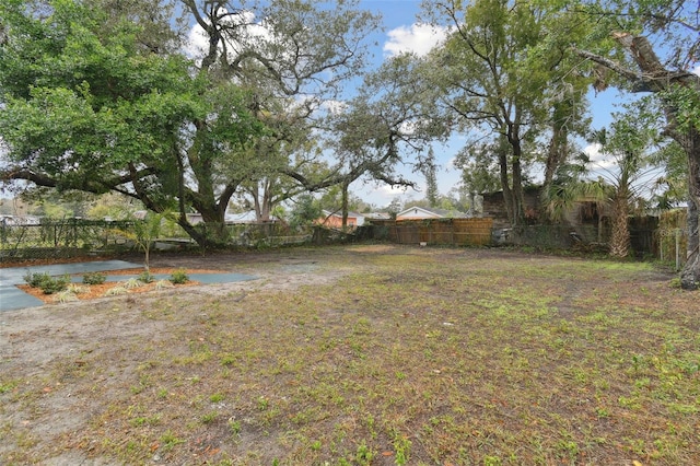 view of yard featuring fence