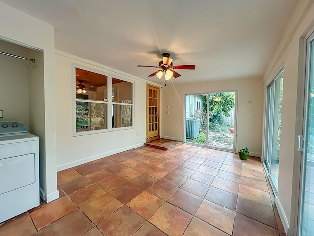 interior space with washer / dryer and ceiling fan