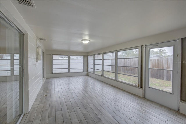 view of unfurnished sunroom