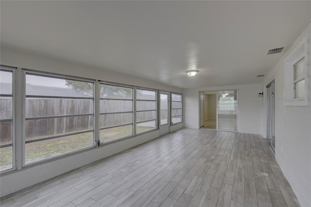 view of unfurnished sunroom