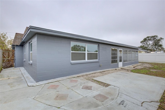 back of house with a patio area