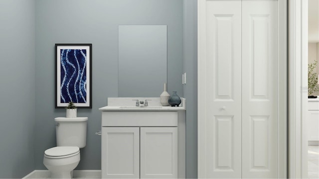 bathroom with vanity and toilet