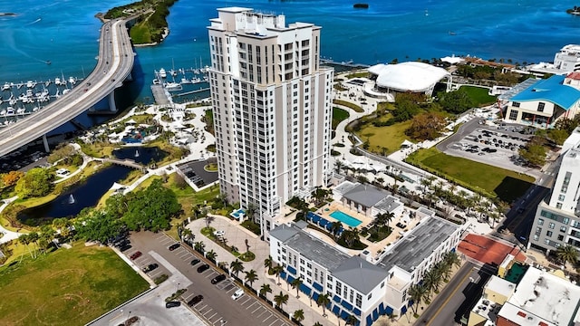 bird's eye view featuring a water view and a city view