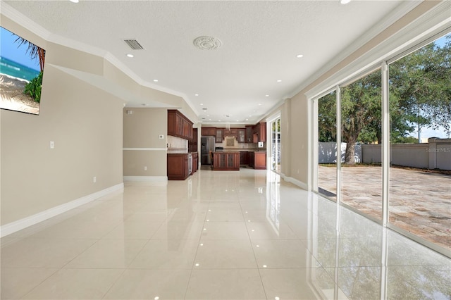 unfurnished living room featuring light tile patterned flooring, ornamental molding, and a textured ceiling