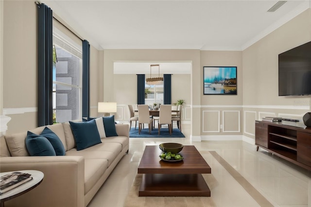 living room featuring light tile patterned floors and a wealth of natural light