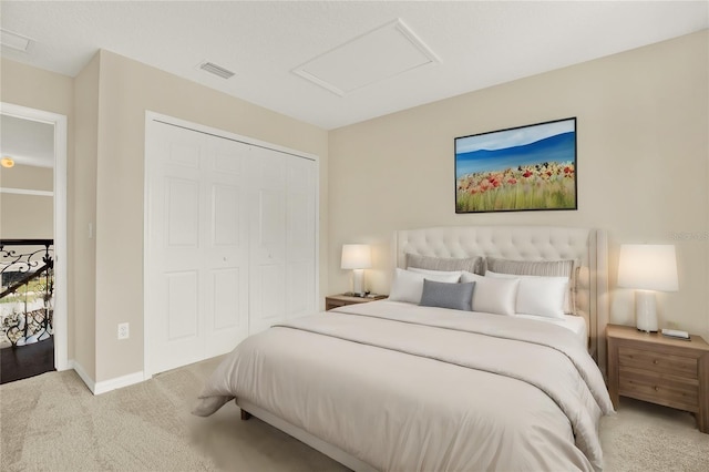 carpeted bedroom with a closet