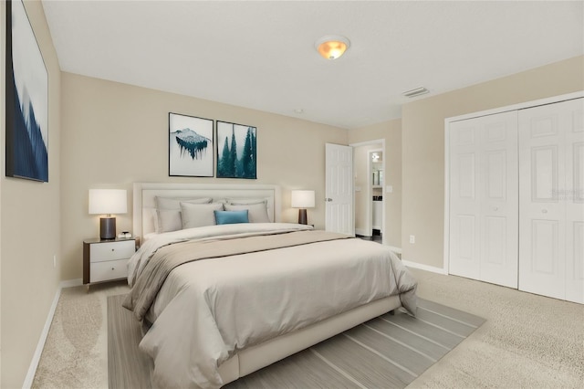 carpeted bedroom with a closet