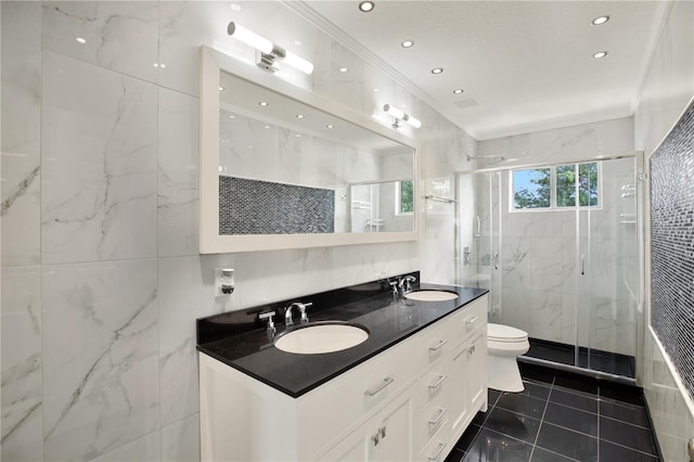 bathroom featuring a shower with door, ornamental molding, tile walls, and toilet