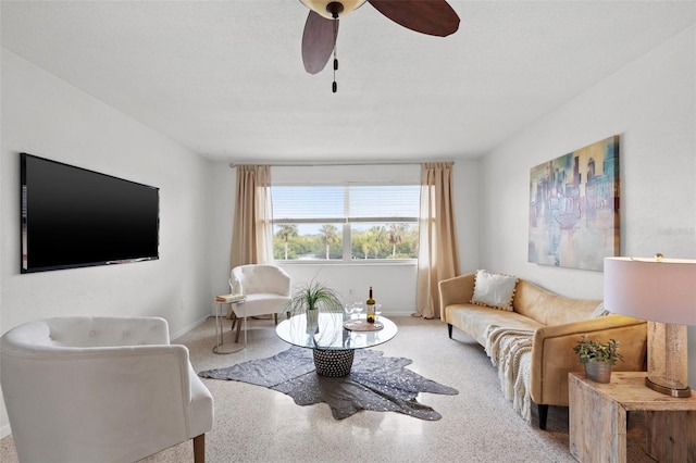 living room featuring ceiling fan