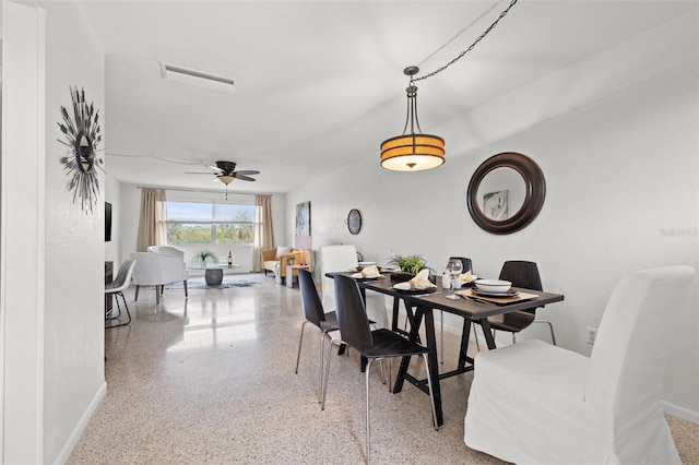 dining space with ceiling fan