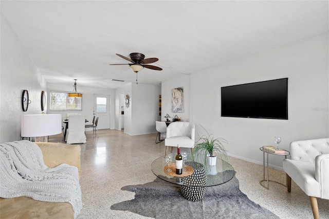 living room with ceiling fan