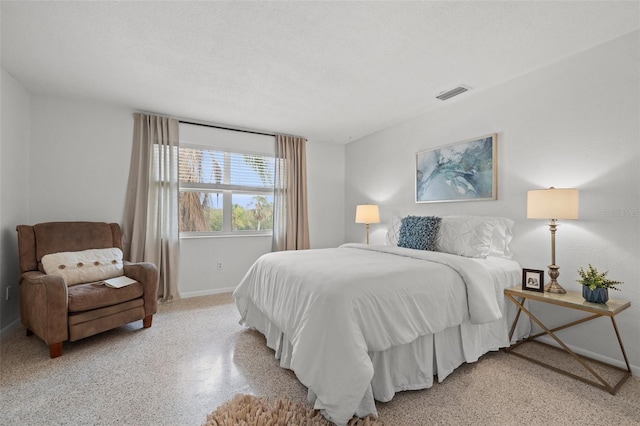 bedroom with a textured ceiling